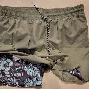 Mens swim trunks with compression lining